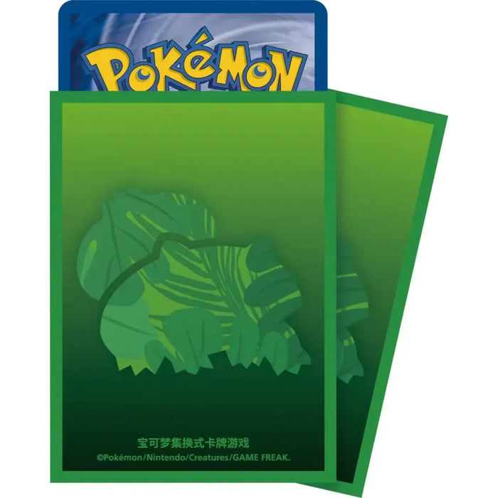 Green Pokémon card sleeves from The Pokémon Company, featuring a stylized silhouette of Bulbasaur from the “Pokemon Collect 151 First Partner Gift Box Bulbasaur (Kinesisk)”, with a partially visible Pokémon card in the background and copyright information in English and Chinese along the bottom edge.