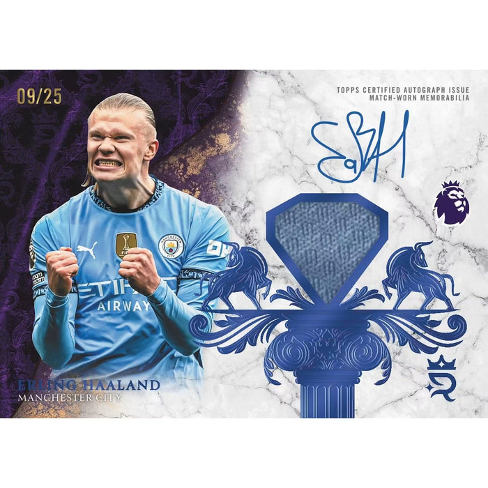 A Topps Royalty 2026 Premier League trading card showcasing a player in a blue Manchester City jersey, fist clenched in celebration. The card features an authentic blue fabric patch, autograph, Premier League logo, and ornate blue designs.