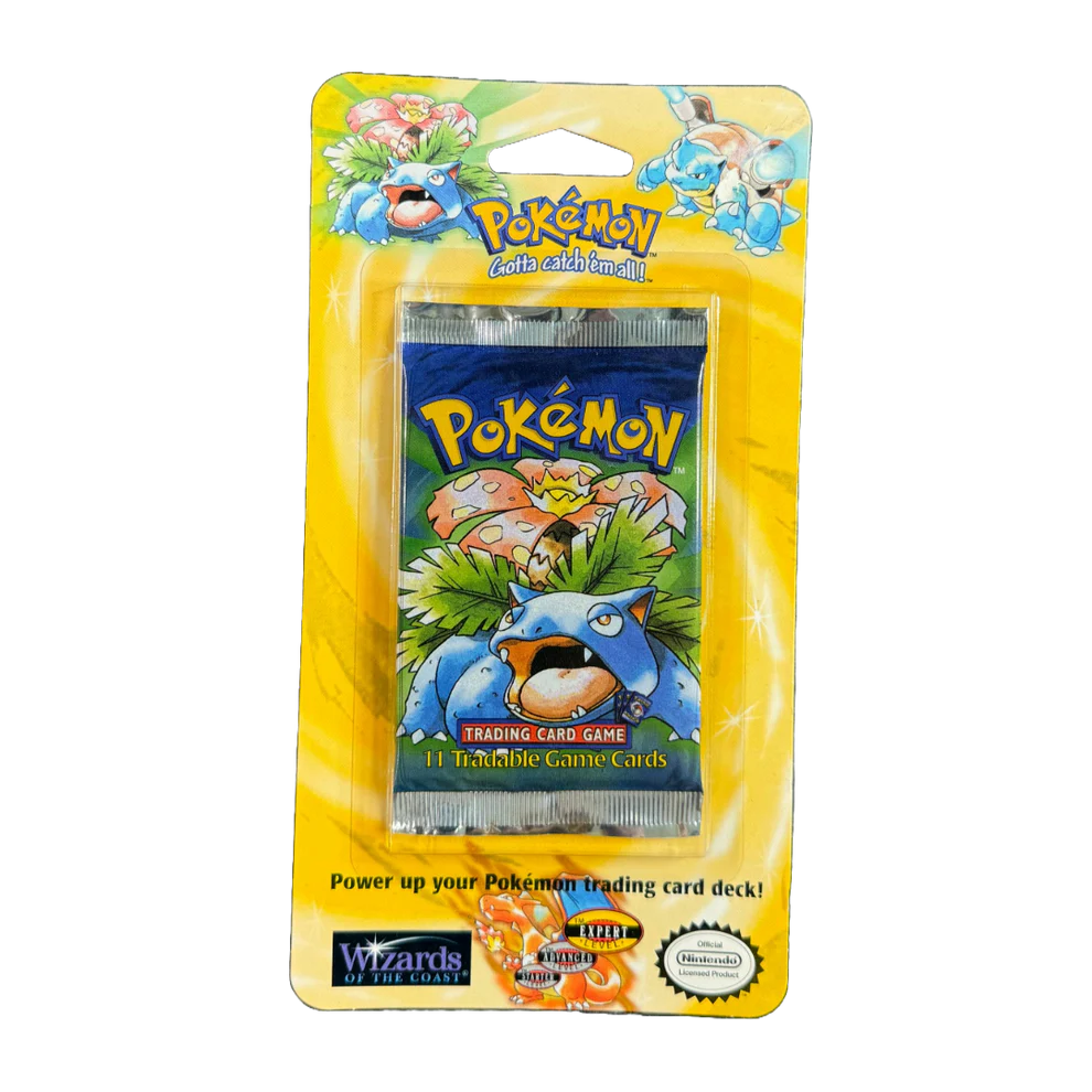 A sealed Base Set Shadowless Blister—Venusaur Artwork by Wizards of the Coast, in original yellow packaging with colorful design. Features the “Power up your Pokémon trading card deck!” text—a true collectible for any fan.