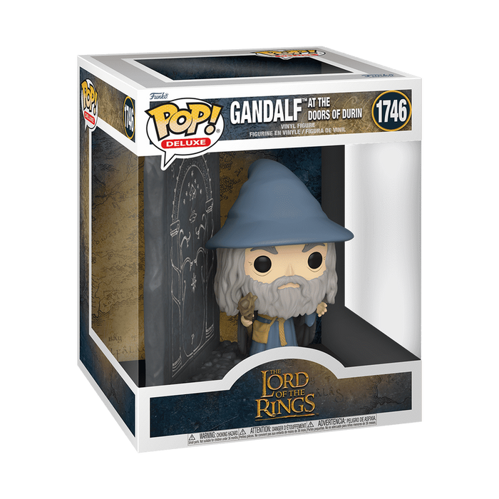Funko POP! Lord of the Rings: Gandalf with Doors of Durin (#1746) by Funko features Gandalf in a blue hat and robe, displayed next to the illustrated Doors of Durin in a collectible box.