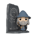 A Funko POP! Lord of the Rings: Gandalf with Doors of Durin (#1746) figure from Funko features Gandalf, the wizard in a blue hat and cloak, standing beside the intricately detailed Doors of Durin.
