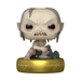 A Funko POP! Lord of the Rings: Plus Gollum (Glow) vinyl figure featuring a pale, crouching Gollum with a large head and sharp teeth, sitting atop a gold ring engraved with glowing Elvish script.