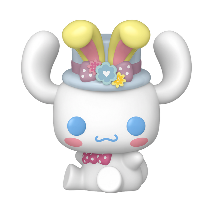 Funko POP! Sanrio: Cinnamoroll with Bunny Ears (#131) by Funko features a cute white bunny character figurine with blue eyes, pink cheeks, a small smile, pastel blue hat adorned with yellow bunny ears and flowers, and a pink polka-dotted bowtie, sitting down with arms raised.