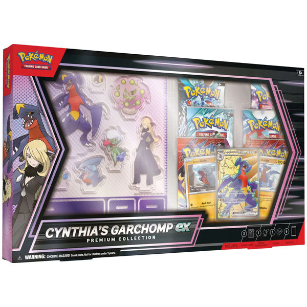 The Pokémon TCG: Cynthia's Garchomp ex Premium Collection by The Pokémon Company includes promo cards, Scarlet & Violet booster packs, a jumbo Garchomp ex card, pin, and coin. Packaging showcases Cynthia and Garchomp.