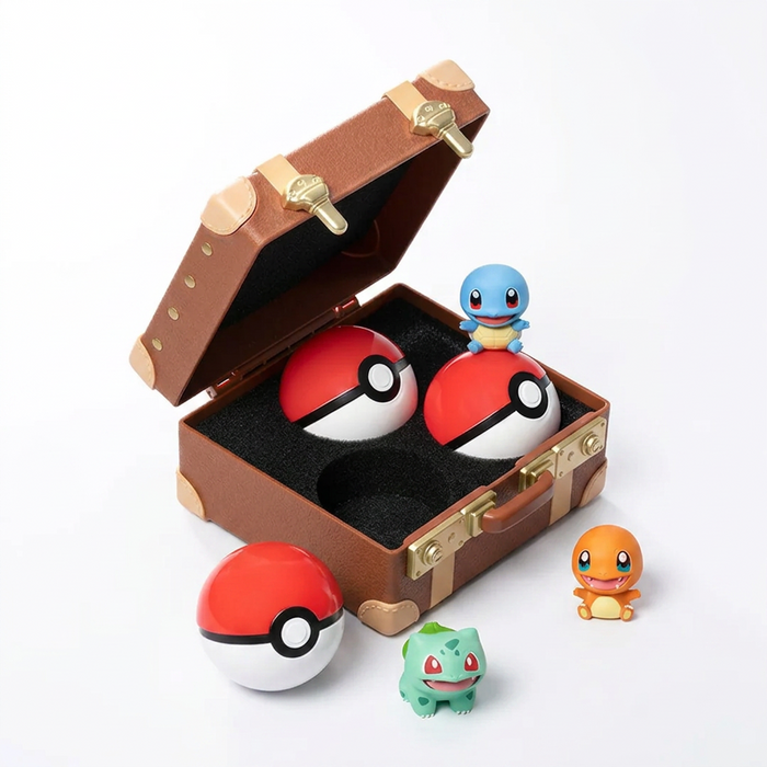 Celebrate the Pokémon 30th Anniversary with the Funism Pokemon 30th Anniversary First Partners Series Figure Blind Box by The Pokémon Company—a charming small brown suitcase featuring three Poké Balls inside, surrounded by toy figures of Squirtle, Bulbasaur, and Charmander—the perfect collector’s piece or First Partner blind box addition to your collection.