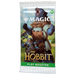 A Magic: The Gathering: The Hobbit Play Booster Display by Wizards of the Coast, featuring packaging with a bear-like creature roaring and a dwarf holding an axe against a scenic landscape backdrop.
