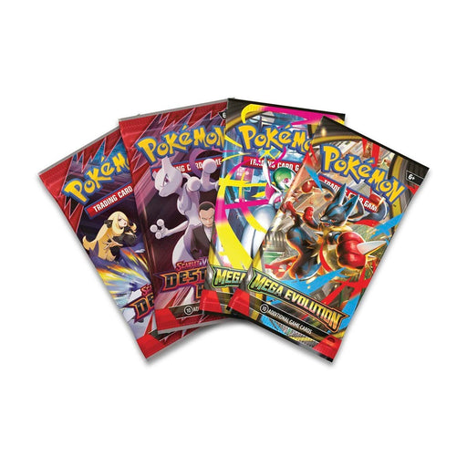 Four assorted Pokémon TCG trading card booster packs from The Pokémon Company’s Pokémon TCG: Mega Latias ex Box, each featuring vibrant artwork with different Pokémon and characters—including highlights from Mega Latias ex—are fanned out in overlapping fashion on a white background.