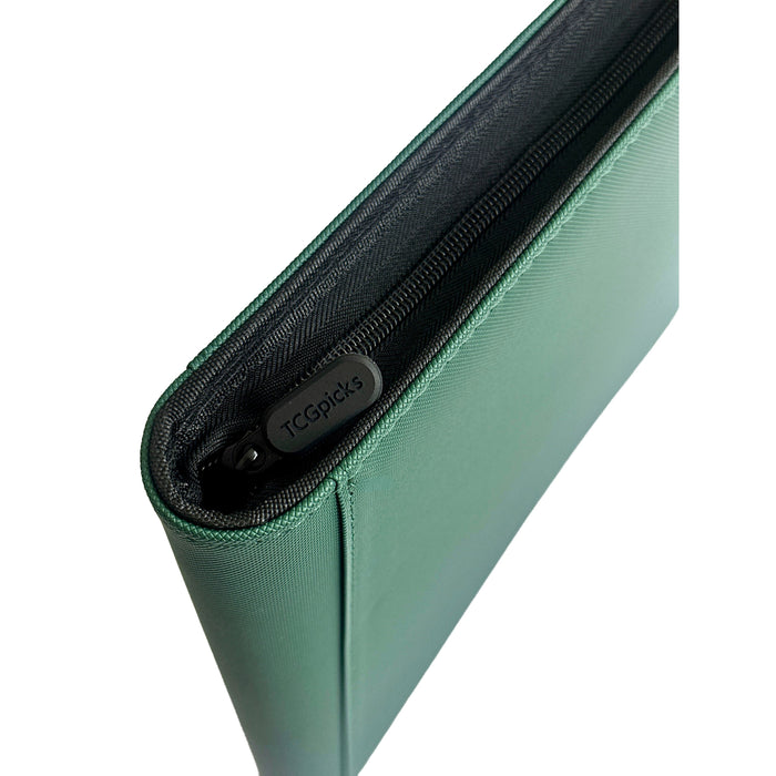 A close-up of a green zippered case, shown partially open. Designed as the TCGPicks: Samlekortmappe [480 pockets 4X4] by Ml Trading for trading cards, the zipper pull is black and labeled TCSplcks. The material appears smooth and sturdy. The background is white.