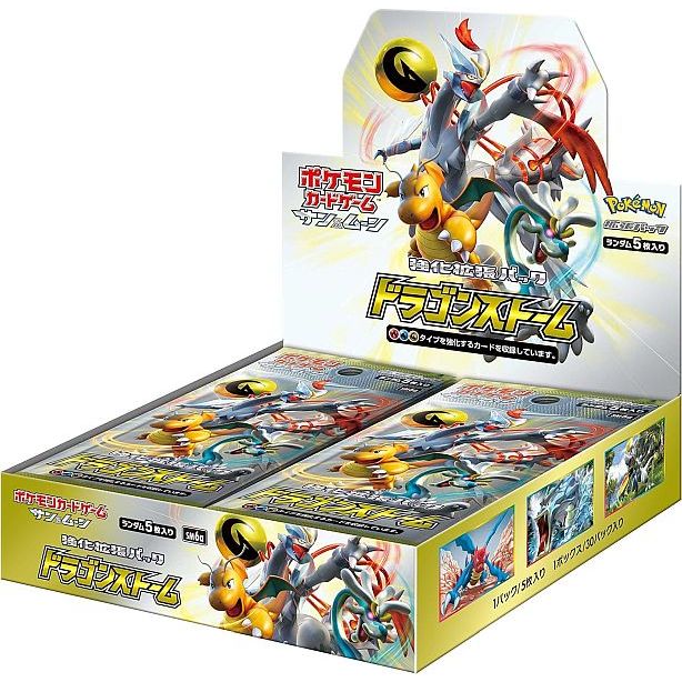 A cardboard display box filled with Pokémon TCG: Dragon Storm Booster Box - Japansk (Sun & Moon: SM6a) packs, featuring Dragon-type Pokémon like Dragonite and Rayquaza on the packaging.