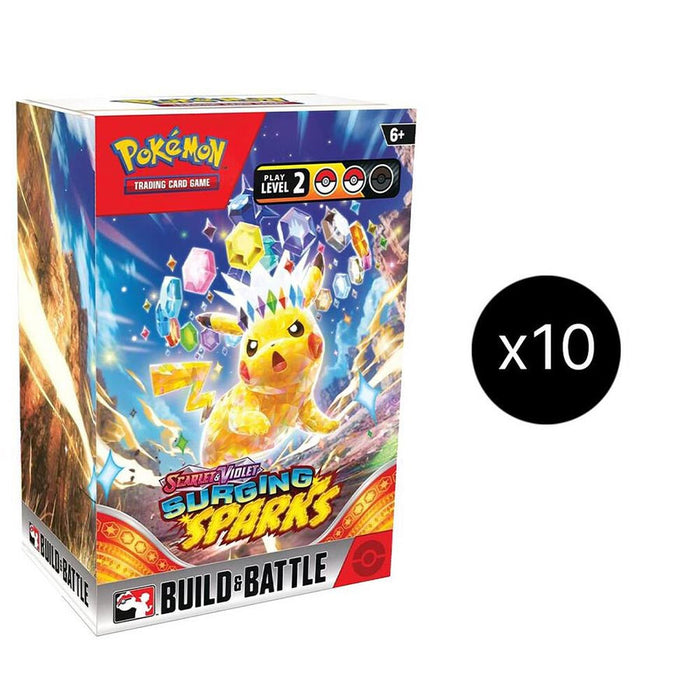 A Pokémon TCG: Surging Sparks Build & Battle Display Case by The Pokémon Company, featuring an electric-themed Pokémon with colorful gem-like sparks and a black circle marked x10 to show the quantity.