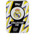 The Topps Collector Tin 2025/26 Real Madrid features the club crest centered on a rectangular tin with bold yellow, blue, and white lightning bolts. “Topps,” “Collector Tin,” and “Official Trading Cards” are displayed on the tin.